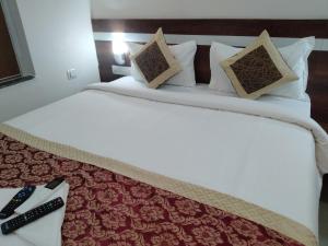 Voodi või voodid majutusasutuse HOTEL SJ PREMIUM toas