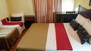 Postel nebo postele na pokoji v ubytování Hotel Chopin