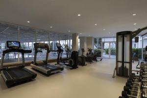 a gym with treadmills and ellipticals in a building at Kaya Side in Side