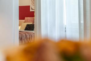 Posteľ alebo postele v izbe v ubytovaní Wine Apartments Florence Moscato