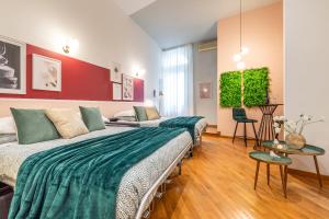 Posteľ alebo postele v izbe v ubytovaní Wine Apartments Florence Moscato