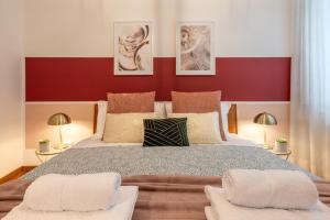 Posteľ alebo postele v izbe v ubytovaní Wine Apartments Florence Moscato