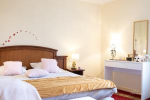 Posteľ alebo postele v izbe v ubytovaní HOME LE SOFT Vic sur Cère
