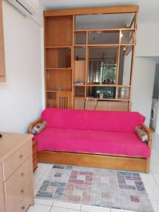 A seating area at Κηπούπολη Kepoupolis Apartment