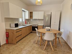 Кухня или мини-кухня в MemRo Village House
 +25 фотографий