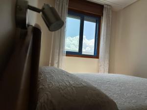 Postel nebo postele na pokoji v ubytování Apartamento Salgueirón