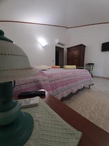 Postel nebo postele na pokoji v ubytování B&B Su Frascu Segau