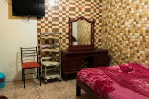 Postel nebo postele na pokoji v ubytování Hostal Carlos Luis