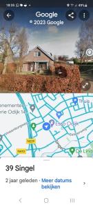 a screenshot of a cell phone with a map of a house at Rustig en centraal in Odijk