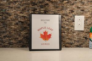 Certifikát, hodnocení, plakát nebo jiný dokument vystavený v ubytování Maple Leaf Acre