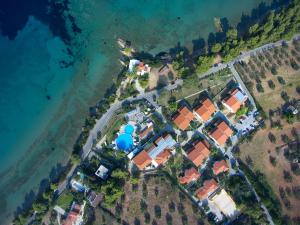 an aerial view of a house next to the water at Acrotel Elea Beach in Elia