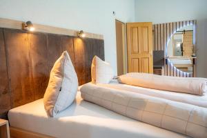 Postelja oz. postelje v sobi nastanitve Lorettohof Hotel Garni