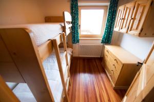 A bed or beds in a room at Chalet Elena