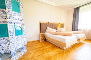 Postelja oz. postelje v sobi nastanitve Lorettohof Hotel Garni