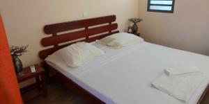 Voodi või voodid majutusasutuse Hotel Benjamin toas