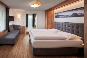 Voodi või voodid majutusasutuse Hotel Gasthof Siggen toas