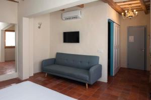 TV a/nebo společenská místnost v ubytování Boutique Hotel RifugioAzul