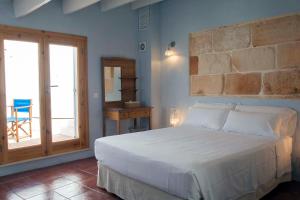 Postel nebo postele na pokoji v ubytování Boutique Hotel RifugioAzul