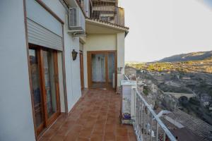 a balcony of a house with a view at Casa Auela Maria in Bocairent
