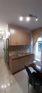 Kuchyň nebo kuchyňský kout v ubytování Apartment Top Centar + 36 fotografií