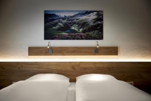 Voodi või voodid majutusasutuse Hotel Gasthof Siggen toas