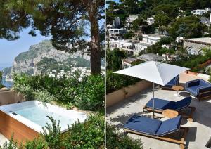 a couple of chairs and an umbrella next to a swimming pool at Villa Lia Hotel Capri in Capri
