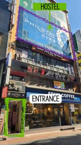 a building with an entrance with the words emergency at Philstay Myeongdong Station in Seoul