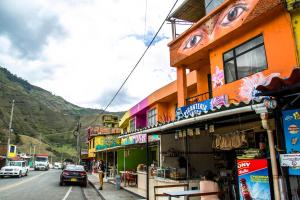 a group of buildings on a street next to a road at SAN ANDRES in Ipiales