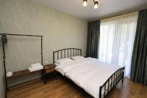 A bed or beds in a room at Heaven Hill