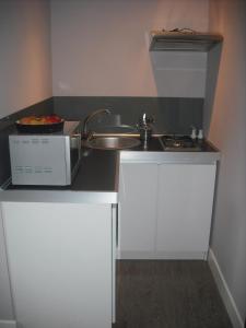 Kuchyňa alebo kuchynka v ubytovaní Apartamenty Algador