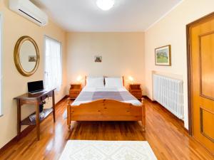 A bed or beds in a room at Exclusive Villa
