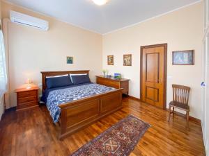 A bed or beds in a room at Exclusive Villa