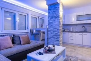 Kuchyň nebo kuchyňský kout v ubytování Rayyan Apartment + 24 fotografií