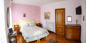 A bed or beds in a room at Exclusive Villa