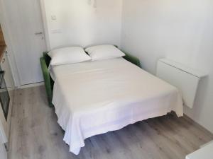Postel nebo postele na pokoji v ubytování Apartment Mara