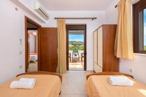 Posteľ alebo postele v izbe v ubytovaní Melfe Villas + 27 fotografií