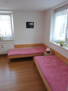 Postel nebo postele na pokoji v ubytování apartman.lara