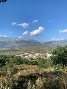 a view of a city from a hill at Isaraj Guest House in Gjirokastër