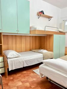 Postel nebo postele na pokoji v ubytování BouganVille holiday homes