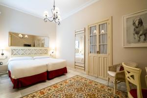 Postel nebo postele na pokoji v ubytování Hotel YIT Casa Grande
