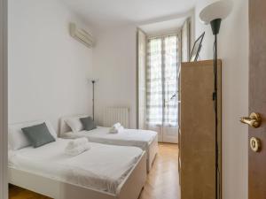 Lova arba lovos apgyvendinimo įstaigoje The Best Rent - Spacious apartment near Colonne S Lorenzo