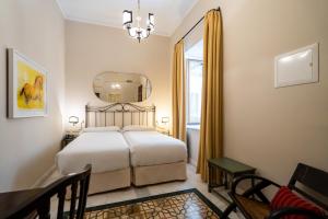 Postel nebo postele na pokoji v ubytování Hotel YIT Casa Grande