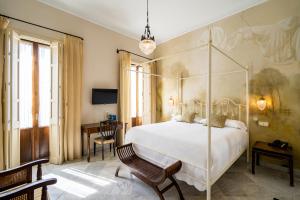 Postel nebo postele na pokoji v ubytování Hotel YIT Casa Grande