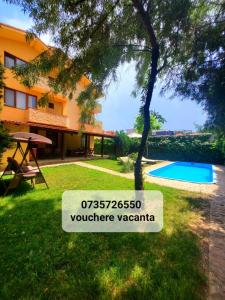 a view of the yard of a villa at Vila Eclipse Mamaia nord in Mamaia Nord