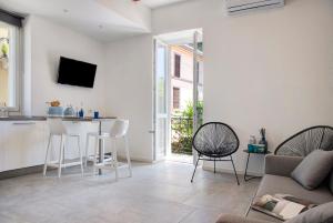 TV a/nebo společenská místnost v ubytování Labiena 12 Lago maggiore