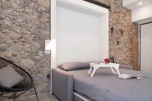 Postel nebo postele na pokoji v ubytování Labiena 12 Lago maggiore