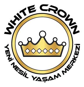 una corona amarilla en un círculo con las palabras m grupo central universal xxx en White Crown Apartman ve Yaşam Merkezi, en Estambul