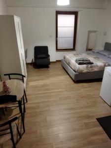 A bed or beds in a room at Largo Otranto - Guest House