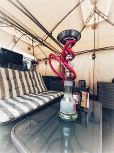 a red snake on a glass table in a tent at The Watergate Inn in York