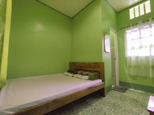Krevet ili kreveti u jedinici u okviru objekta BARRIL GREEN HOMESTAY